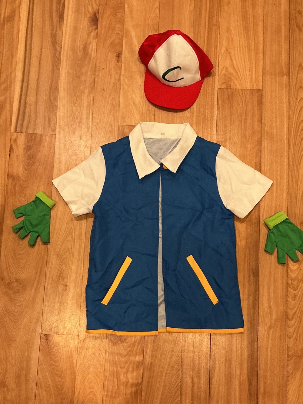 Pokémon Ash Ketchum Trainer Costume with Red Cap and Green Gloves